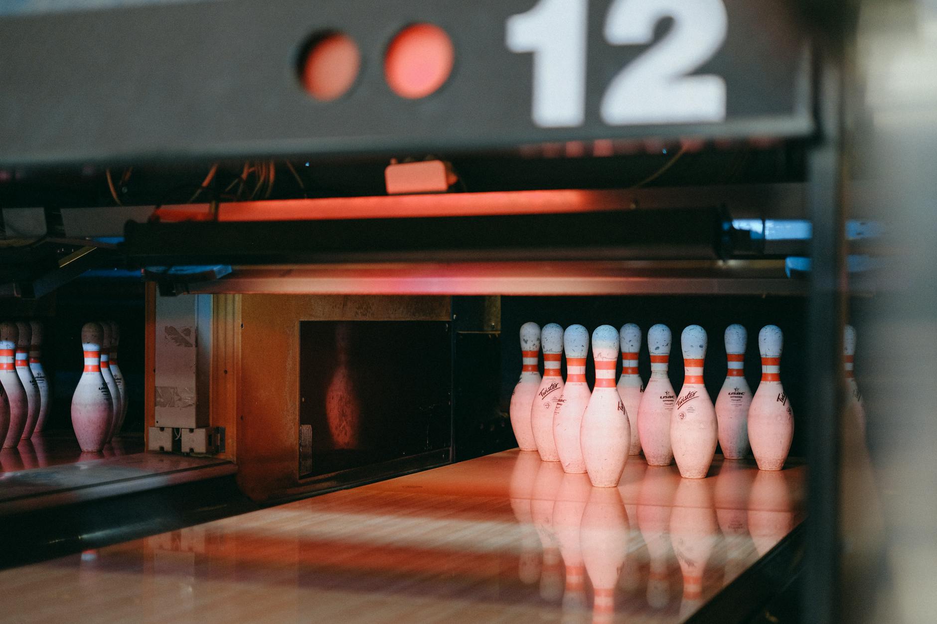 bowling pins illuminated by red light